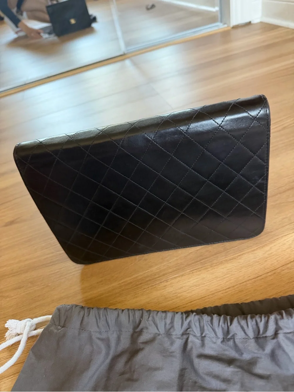 CHANEL Black Quilted Lambskin monoflap with Gold CC Emblem